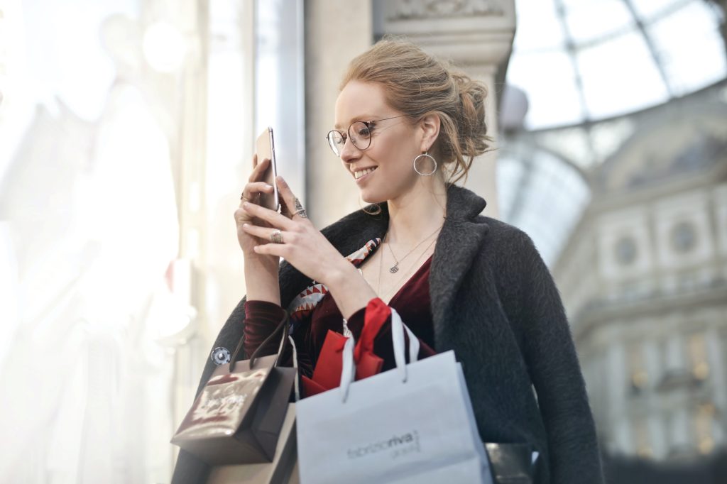 girl happy shopping online with Rewards Programs